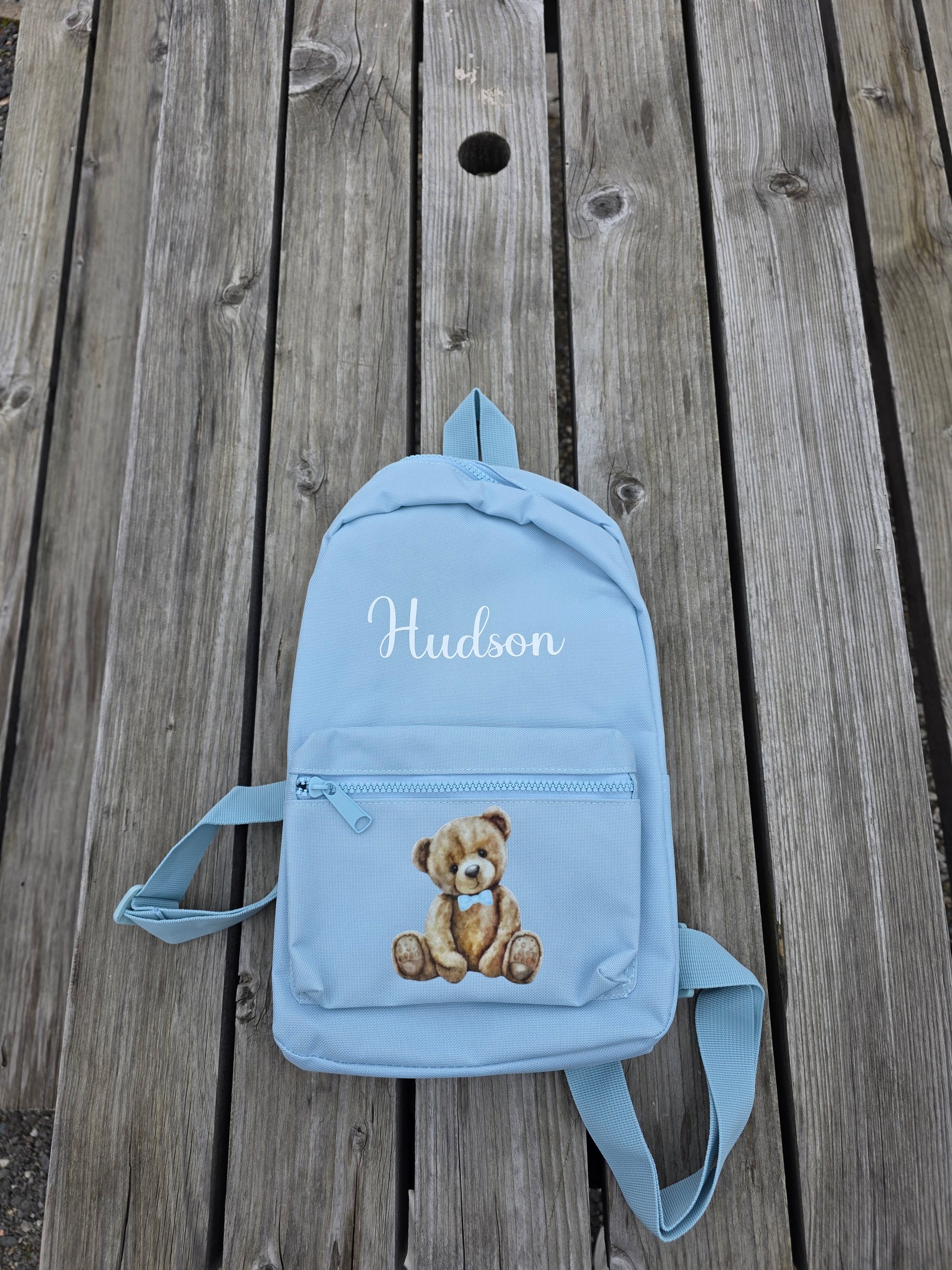 Personalised blue kids backpack with custom name and teddy bear design for girls nursery or preschool bag